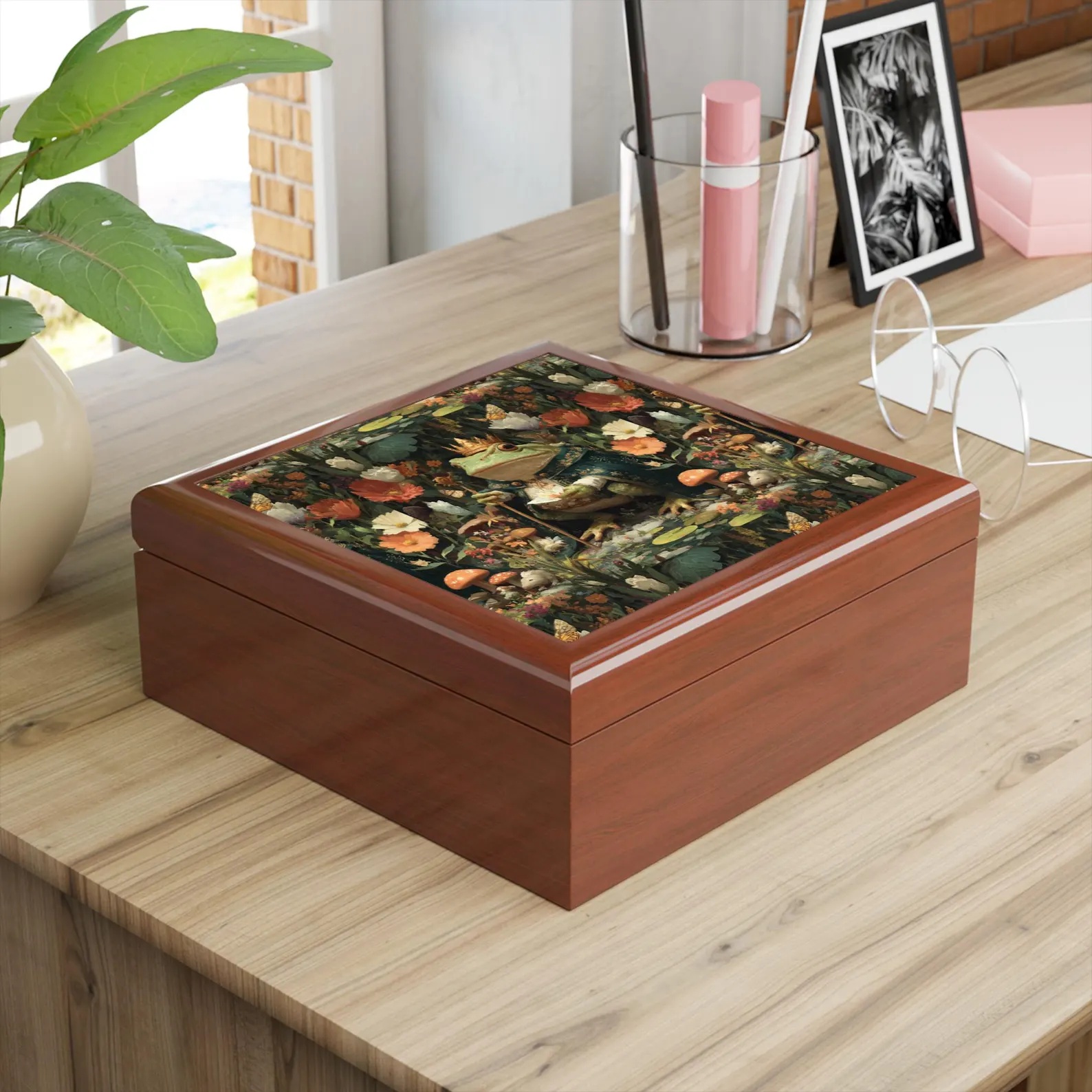 Wooden jewelry box with a rich wood finish featuring enchanting Frog King artwork on the lid. One box is shown closed to display the detailed fantasy design, while a second box is open to reveal a soft-lined interior for storing jewelry, keepsakes, and small treasures.